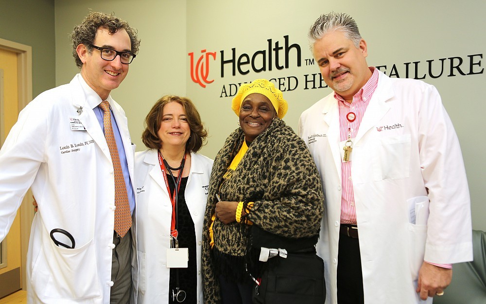 Arnetta Profit-Greer, center, visits the UC Health Advance Heart Failure Treatment Center. Louis Louis, MD, far left, Stephanie Dunlap, DO, and Russell Hoffman, nurse practitioner, provide care for Profit-Greer.