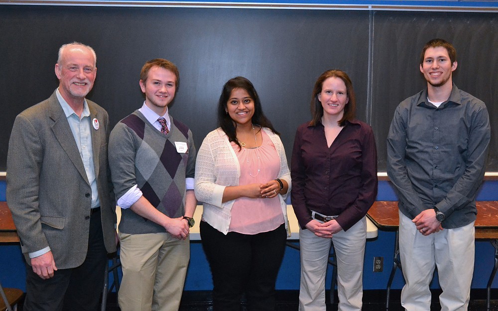 Iain Cartwright, PhD, associate dean for graduate education, with honorable mention winners Cameron McDaniel and Swati Tiwari, along with second place winner Marie Matrka, and honorable mention winner Nick Brown.