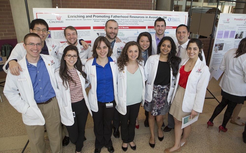 First-year medical students displayed posters for service learning projects in the CARE/Crawley Atrium April 29, 2015. 