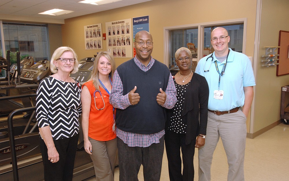 Jeanne Flick, Access Coordinator, Heart Failure; Stephanie Moore, Exercise Physiologist, Cardiac Rehab; Curtis Ashby; Shirley White, Access Coordinator, Heart Failure; and Chris Mueller, Exercise Physiologist, Cardia Rehab are featured in the UC Health Advanced Heart Failure Treatment Center.