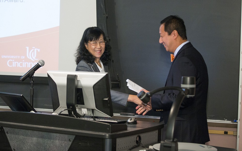 Shuk-Mei Ho, PhD, welcomed UC President Santa Ono, PhD, to the Department of Environmental Health's celebration of its history.
