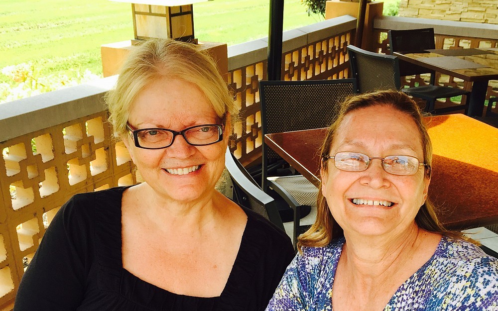 Deborah Ambroza with her friend and caregiver Nancy Bradford-Herman at Seasons 52. Ambroza took full advantage of the city while she was being treated at the UC Cancer Institute ... and she fell in love with it. "I really could move here," she says.  