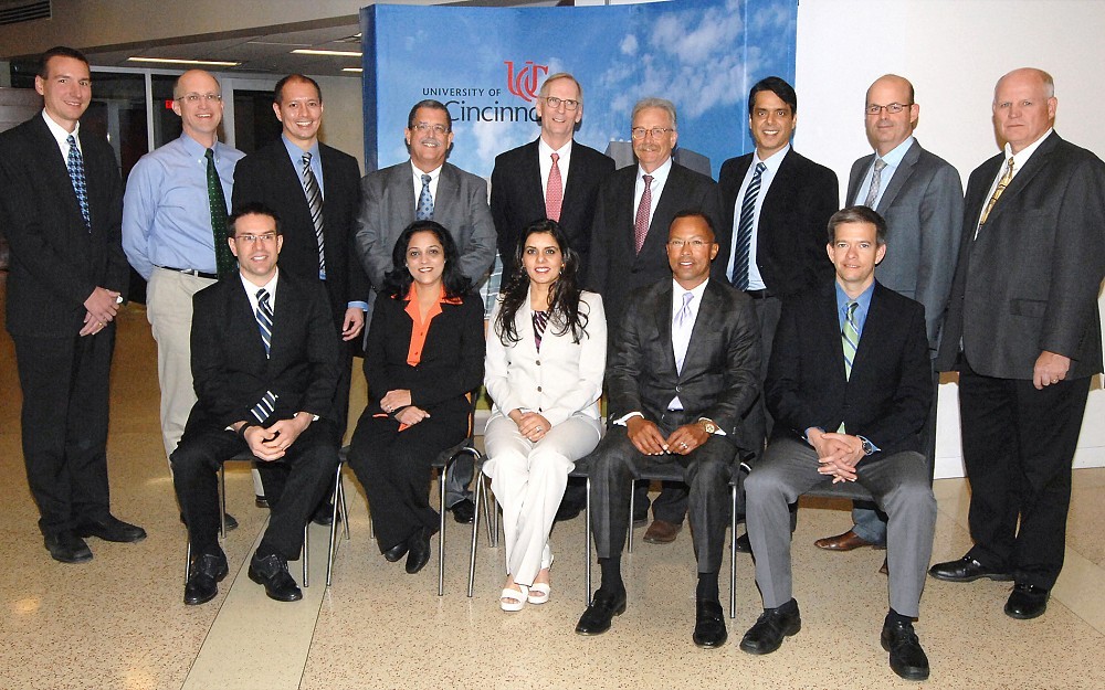 Thirteen University of Cincinnati College of Medicine professors received the Patient Experience Excellence Award on Jan. 6, 2016. First row (from left): Adam Ingraffea, MD; Sona Sharma, MD; Nadia Yaqub, MD; Hugh Gloster, MD; and Michael Holliday, MD. Back row: Andrew Duker, MD; Bradley Mathis, MD; Michael Canos, MD; William Ball, MD, dean of the UC College of Medicine; Richard Lofgren, MD, president and CEO of UC Health; Myles Pensak, MD, senior associate dean for health affairs (Drs. Ball, Lofgren and Pensak hosted the event and made remarks); Abid Yaqub, MD, Lee Zimmer, MD, PhD, and Stephen Dailey, MD.