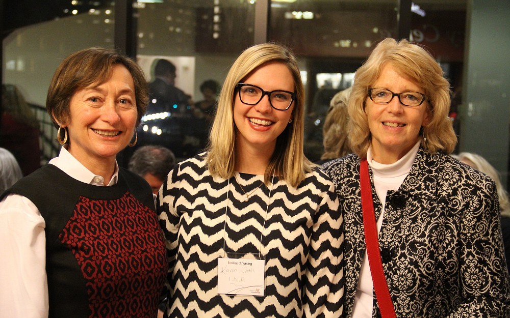 Nursing student Karen Roth (center) celebrates her graduation with a master's degree in Family Practice Nursing at the UC College of Nursing's December 2015 Distance Learning Graduation Reception. At left is Dean Greer Glazer, PhD, and (right) is Karen's mother and 1977 College of Nursing alumna Eileen Roth.
