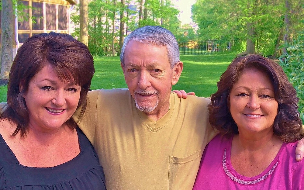  David Polisini with his daughters Toni and Susie. 