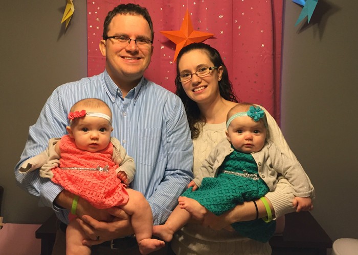 Adam Crosby with his wife Amber and daughters, Addison and Samantha.