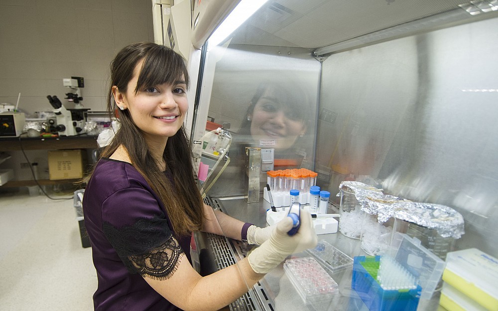 Nina Bertaux-Skeirik, a fourth-year graduate student in Systems Biology and Physiology, is featured in a laboratory in the Medical Sciences Building.