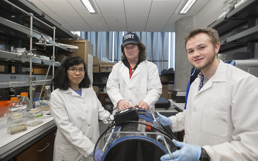 Dan Hassett, PhD, with his lab members