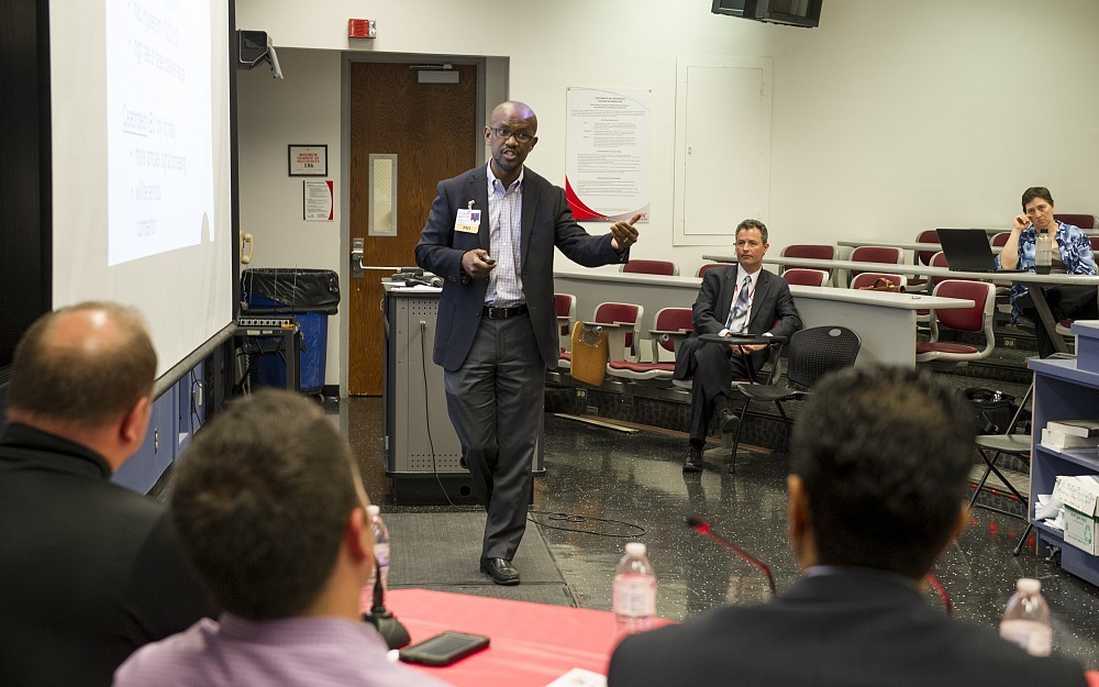 Opeolu Adeoye, MD, associate professor of Emergency Medicine and Neurosurgery Department of Emergency Medicine, giving the winning Shark Tank presentation at Research Week 2016