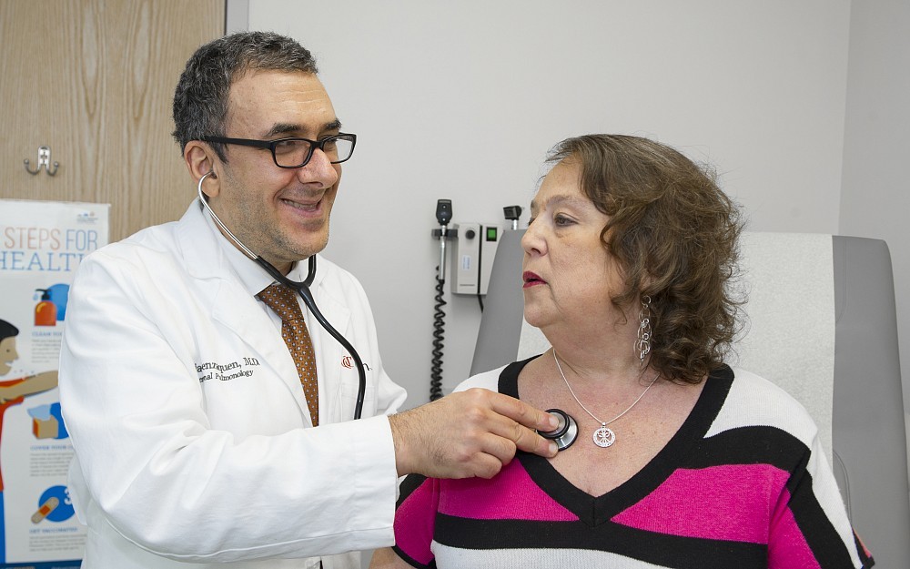 Lisa Levan is examined by Sadia Benzaquen, MD, UC Health physician and assistant professor in the University of Cincinnati College of Medicine Division of Pulmonary, Critical Care and Sleep Medicine.