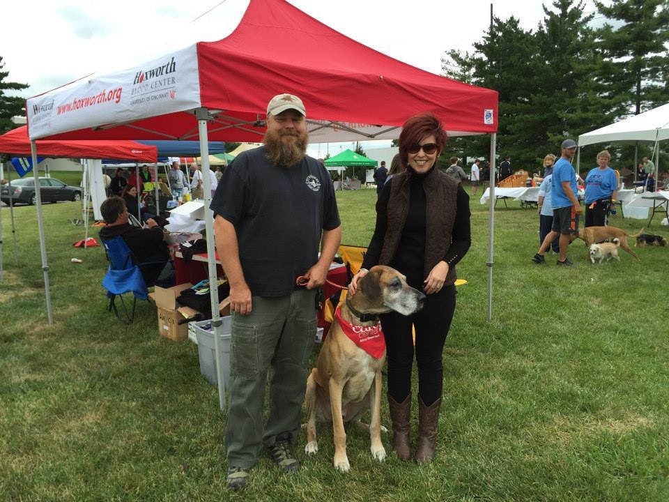 Keith Gardner, his dog Buckley and Alecia Lipton of Hoxworth Blood Center at the Care Center Blood Drive