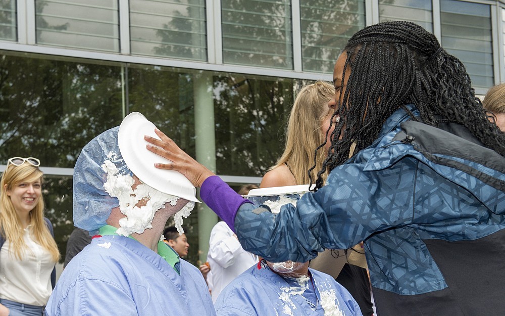 
The "Pie-A-Prof" event, held May 13 in front of CARE Crawley Building, helped generate funds for education and charitable activities along with laughs. Aaron Marshall, PhD, received today's pie.