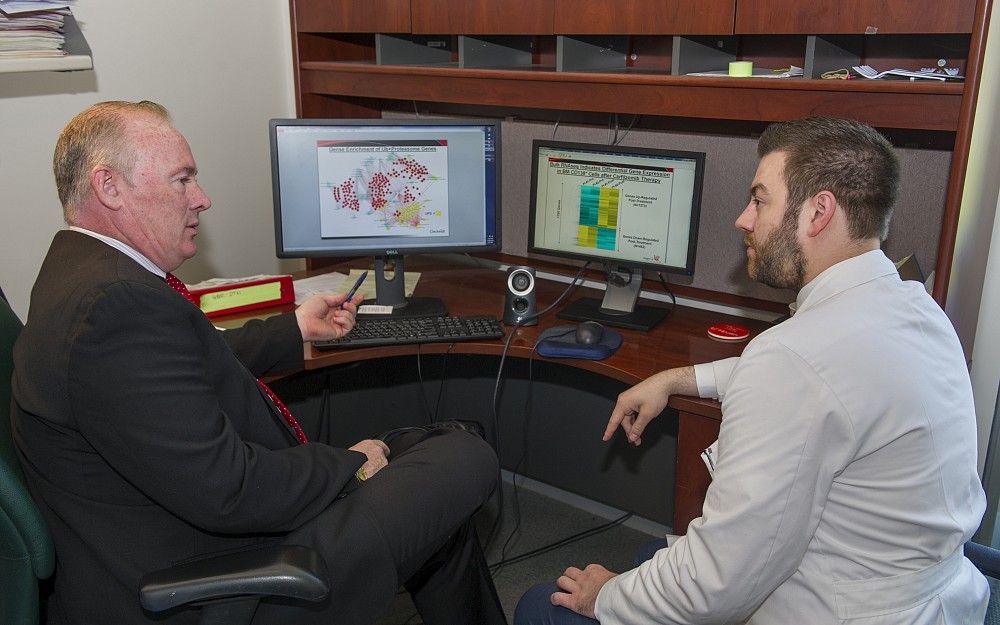 Kidney transplant researchers James Driscoll, MD, PhD, (left) and Simon Tremblay, PharmD 