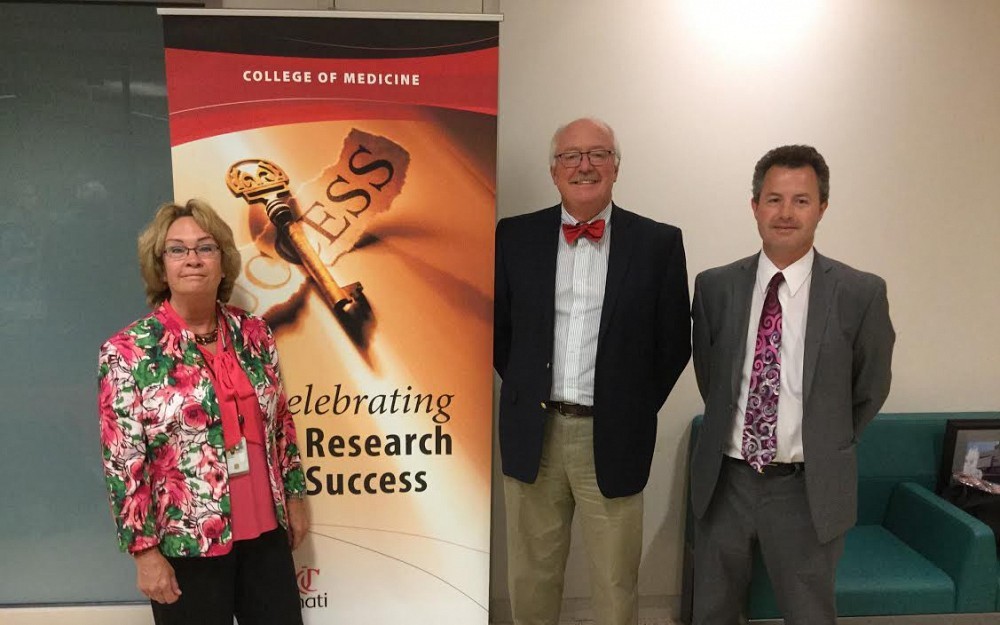 James Herman, PhD, center, pictured with Melanie Cushion, PhD, and Christopher Lindsell, PhD