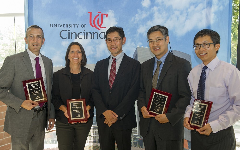 The College of Medicine celebrated its research successes and congratulated key contributors during the Research Recognition Program Sept. 22. Award winners from left to right: Gregory Fermann, MD, Clinical Trialist of the Year; Susan Waltz, PhD, Research Service Award; Atsuo Sasaki, PhD, Rising Star Award; Daniel Woo, PhD; and Changchun Xie, PhD, both also receiving Research Service Awards.