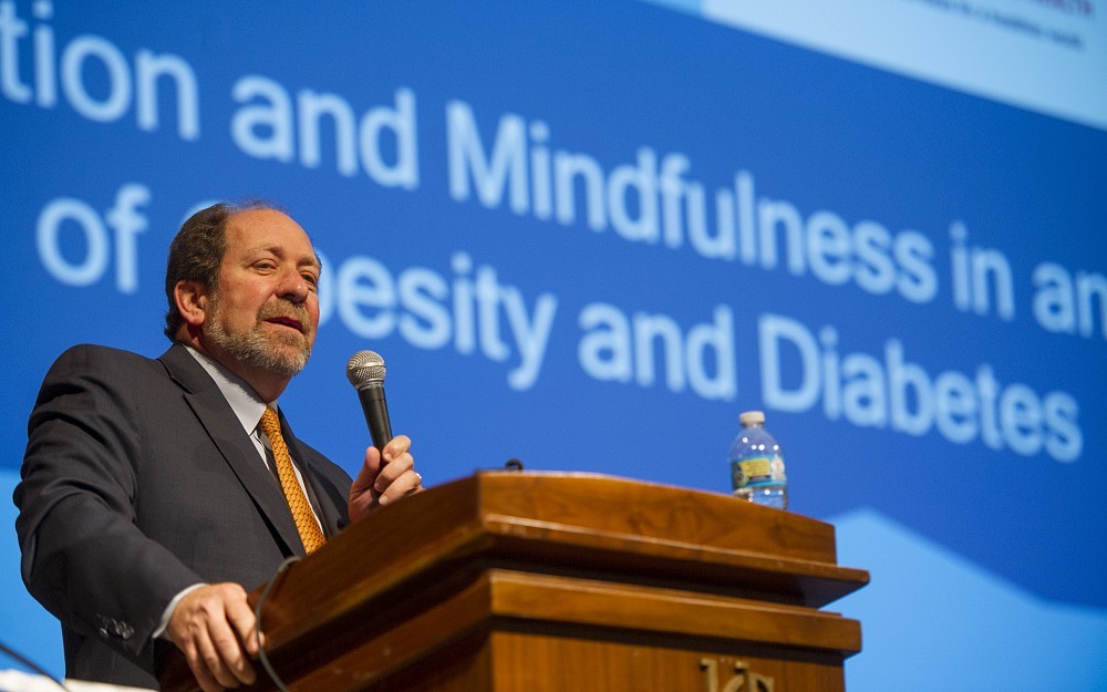 David Eisenberg, MD, speaks to UC medical students in Kresge Auditorium.