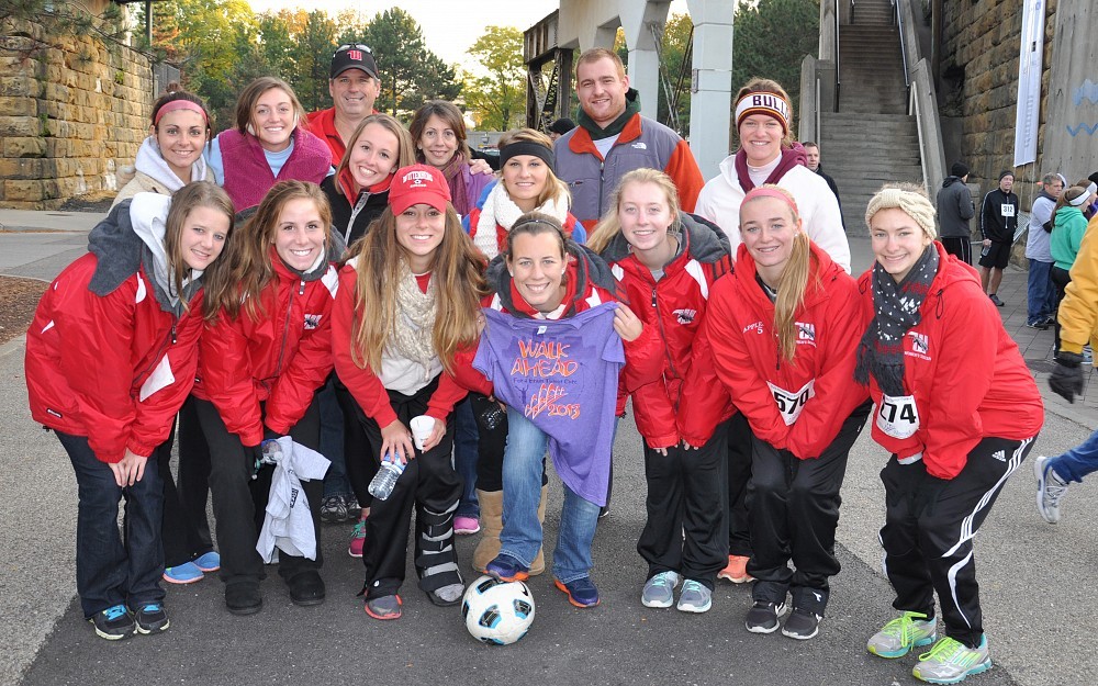 Leslie OliverÂ now Leslie SommerÂ center, with family, friends and her Wittenberg University soccer teammates at the 2013 Walk Ahead. 
