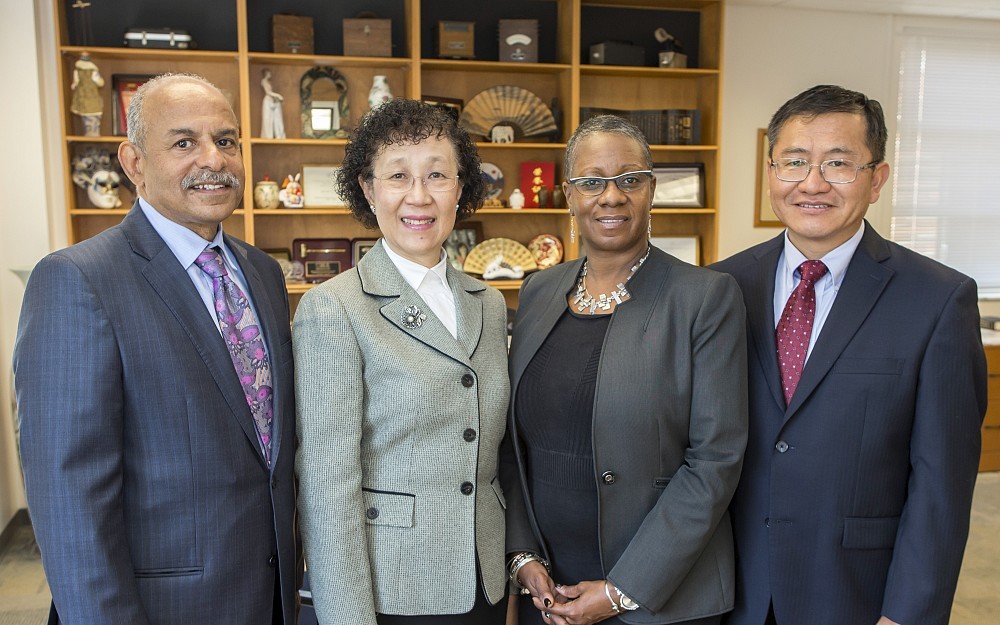 From left to right: Dwight Tillery, Shuk-Mei Ho, Renee Harris and Jun Ying commemorate the new Dwight Tillery Fellowship to support students of public health at UC.