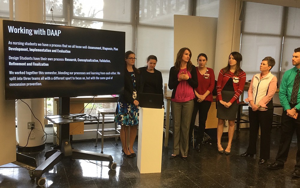 Students from the College of Nursing display some of the collaborative work done with DAAP students on Dec. 1, 2016
