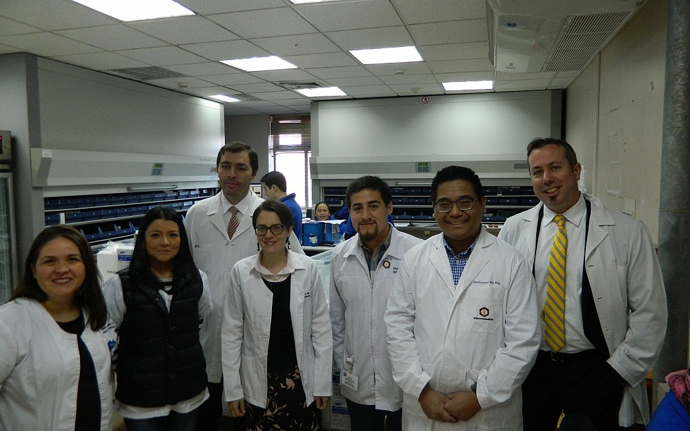 UC College of Pharmacy representatives visit a hospital pharmacy in Chile.  