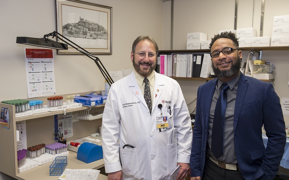 Carl Fichtenbaum, MD, shown with Jaasiel Chapman, in the UC Clinical Trials Unit in Holmes Hospital.