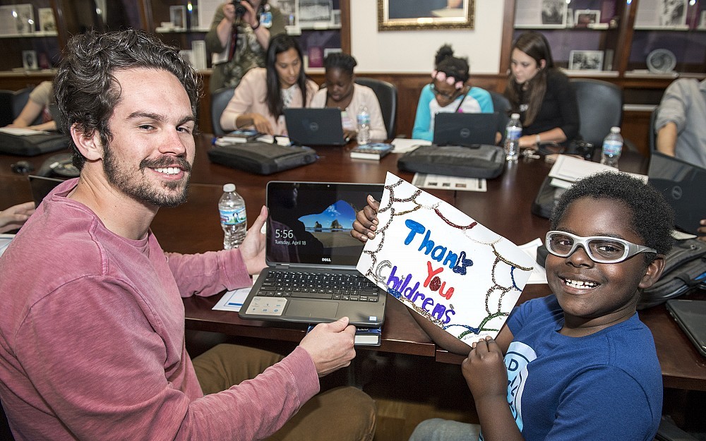 Matthew Stewart, a second-year medical student, is shown with mentee, Javonte Nelson, at the Med Mentors special ceremony in the College of Medicine.