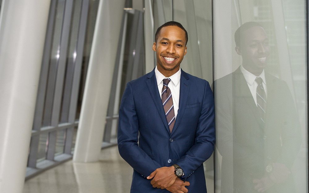 Nathaniel Harris, a fourth-year medical student, is shown in CARE/Crawley Atrium. 