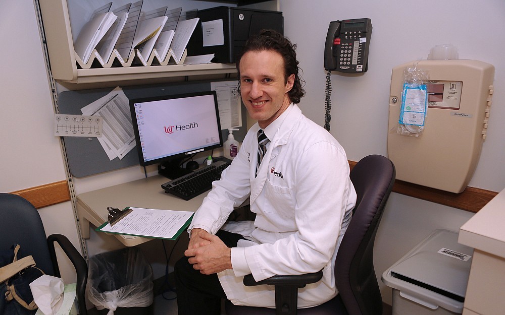 Dylan Steen, MD, assistant professor in the Division of Cardiovascular Health and Disease, sees heart patients in Hoxworth Center.