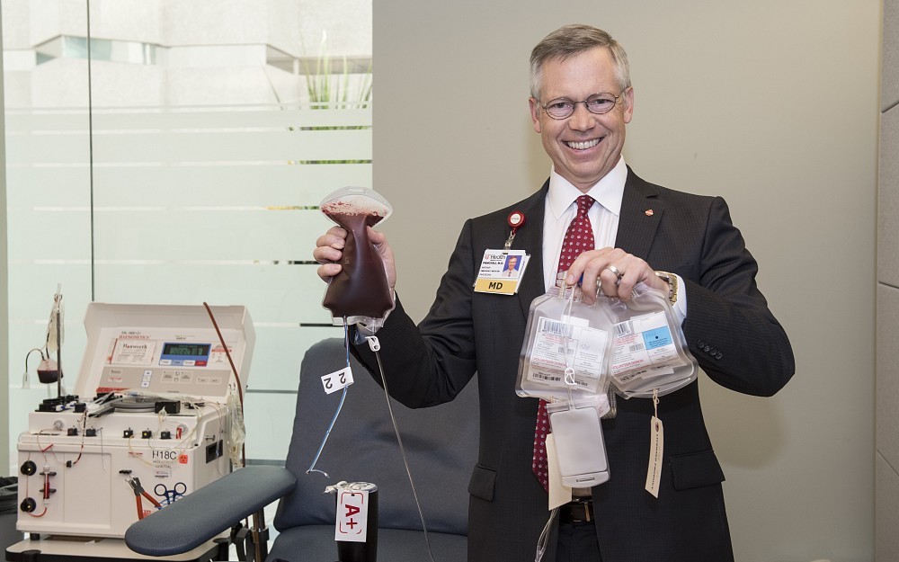 Art Pancioli, MD, makes his 100th blood donation at Hoxworth Blood Center