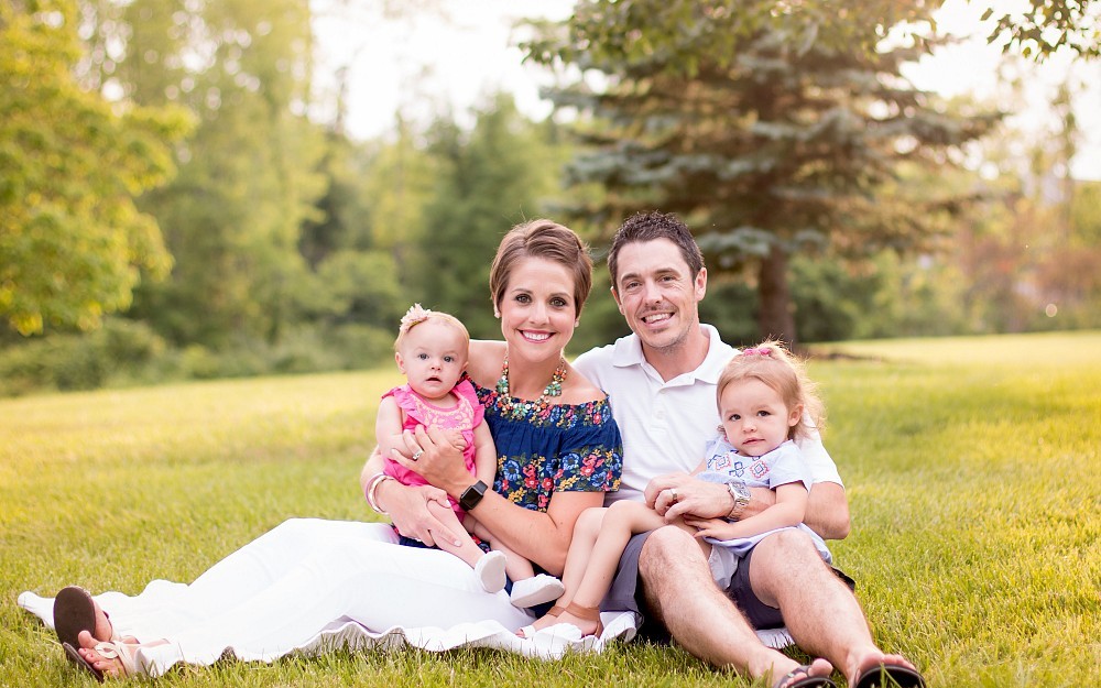 Whitney Hoffer, 31, with her husband Billy and daughters Madison and Makenzi. Hoffer found out she had Hodgkin's lymphoma while pregnant with Madison. 