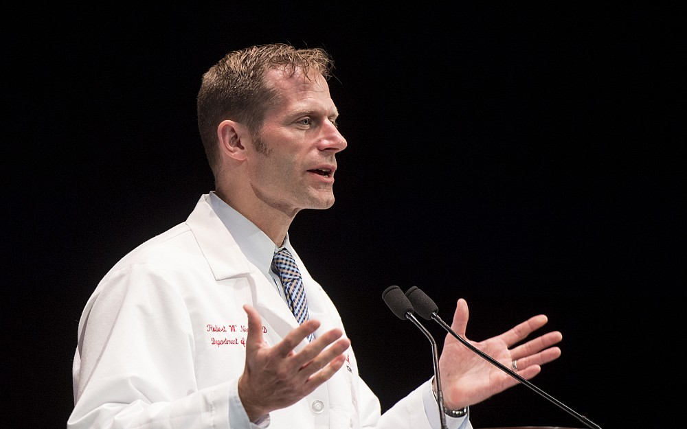 
Robert Neel, MD, vice chair of education and director, residency program in the Department of Neurology and Rehabilitation Medicine, was the keynote speaker for the College of Medicine 2017 White Coat Ceremony. 