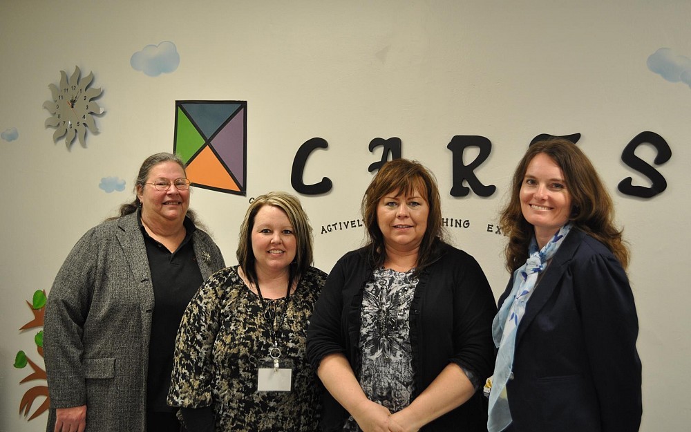 Along with Erin Haynes, DrPH (far right) Department of Environmental Health, the East Liverpool, Ohio community team included: the late Roxanne Burns, PhD, Kent State University East Liverpool campus; Amy Sigley, RN; and Delores Silverthorn, RN.