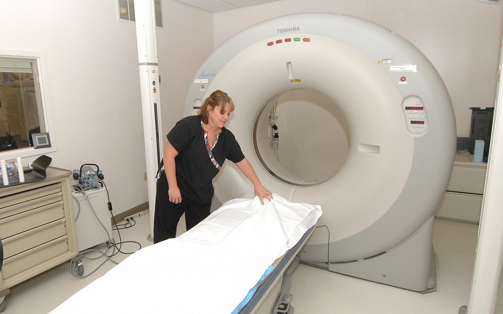With low-dose CT scanning, which are used in lung cancer screening, the X-ray tube is rotated around the patient during the imaging test to create a 3-D picture of the chest which can detect very small spots.