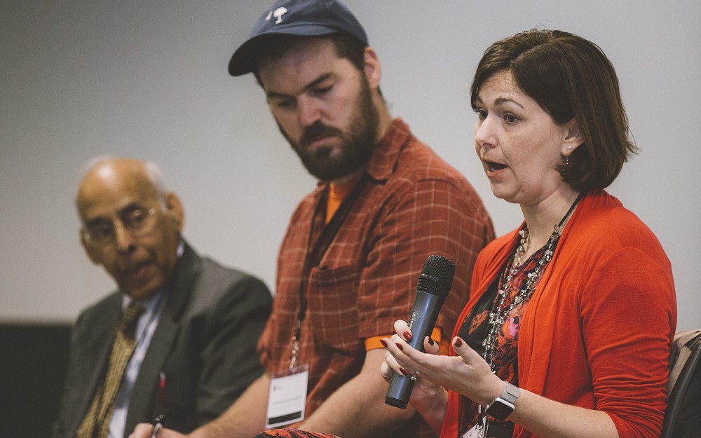 Jennifer Brown, PhD, assistant professor in the Division of Addiction Sciences in the Department of Psychiatry and Behavioral Neuroscience at the UC College of Medicine speaking at the Smart Regions Conference in October 2017 as Prasad Chalasani of MedTech MD and Michael Schmidt of Meta Matter look on.