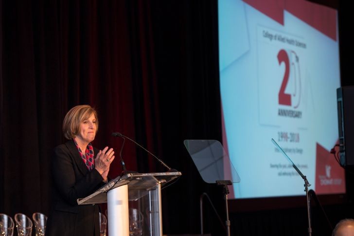Tina Whalen, EdD, dean of the College of Allied Health Sciences, speaking at the '20 in 20' celebration