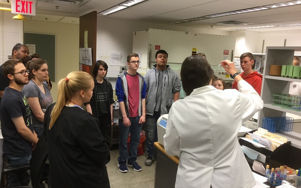 Students from Hillsboro High School visit the Division of Infectious Diseases during a field trip on May 8, 2018
