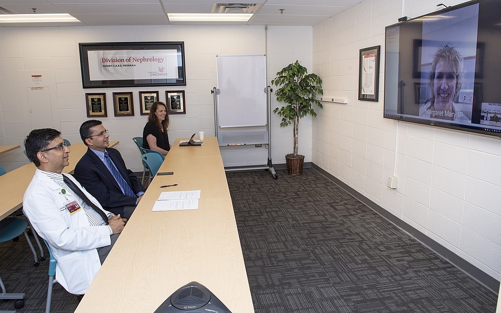Tele-Nephrology demonstration in the Division of Nephrology, Kidney C.A.R.E. Program with Amit Govil, MD and Charuhas Thakar, MD, communicating with a physician from Margaret Mary Hospital in Batesville, Indiana.