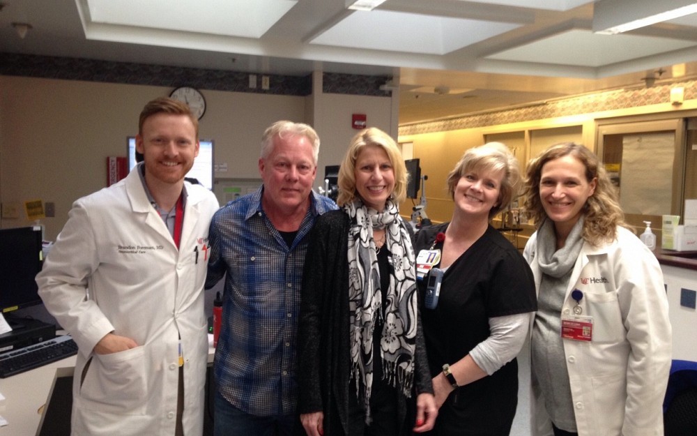 Mark and Mary Cooper (middle), stopped by the neuroscience ICU to thank Mary's care team, which included: (from l to r) Brandon Foreman, MD, Wendi Fox, RN, and Simona Ferioli, MD. 