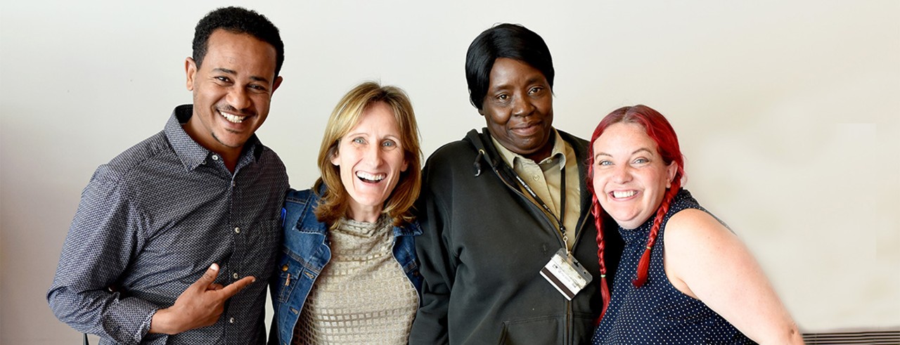 staff smiling together