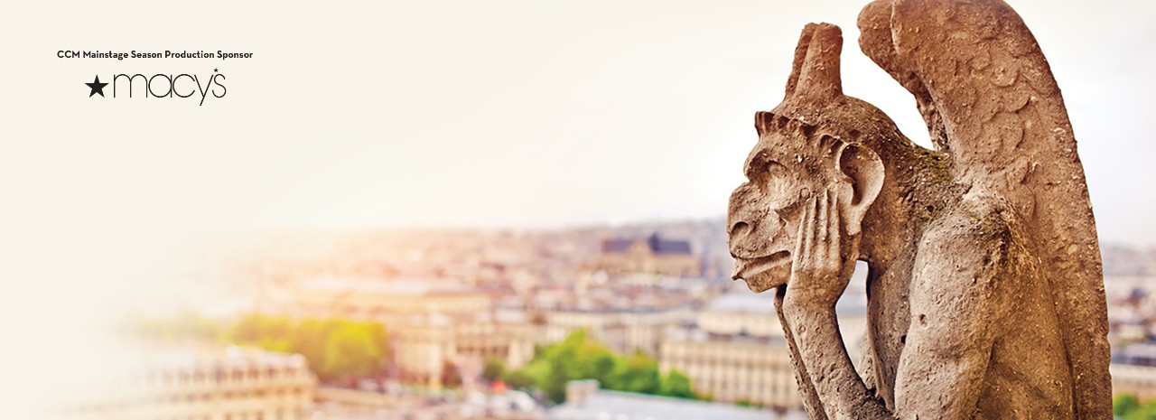 Gargoyle looking out at Paris from the top of Notre Dame.