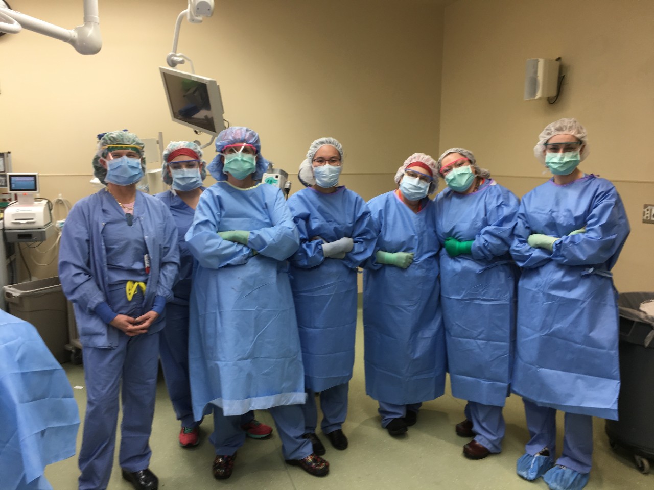 Dr. Jaime Lewis ( third from left) with her surgical team in the OR