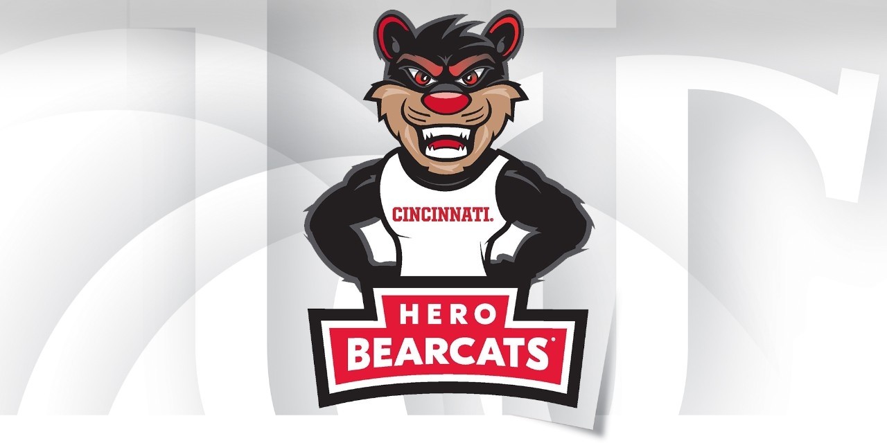 Graphic design of a Bearcat mascot standing behind a red banner reading Hero Bearcats