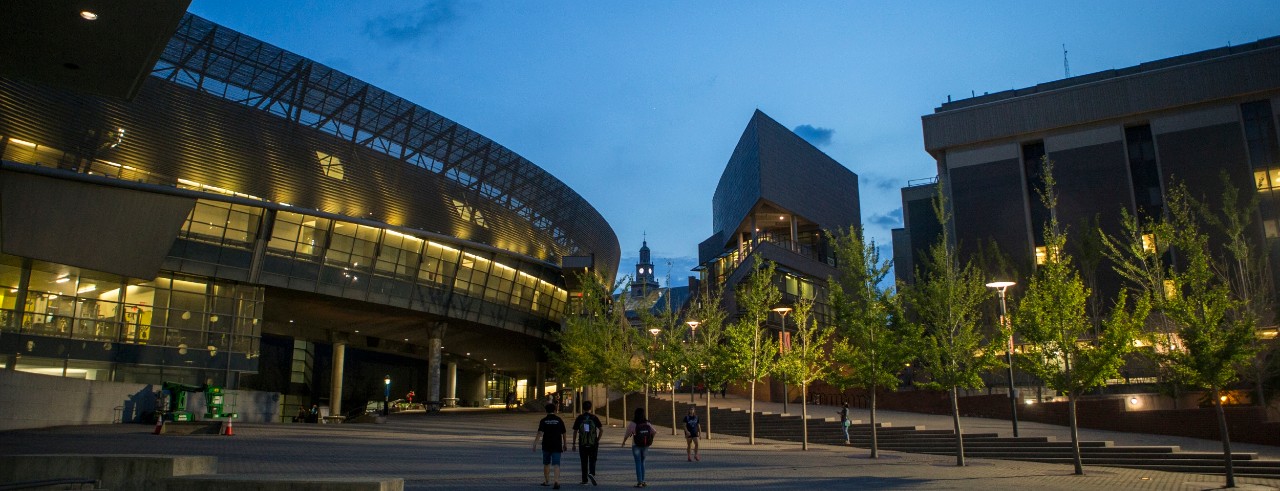 A photo of UC's main campus after sunset.