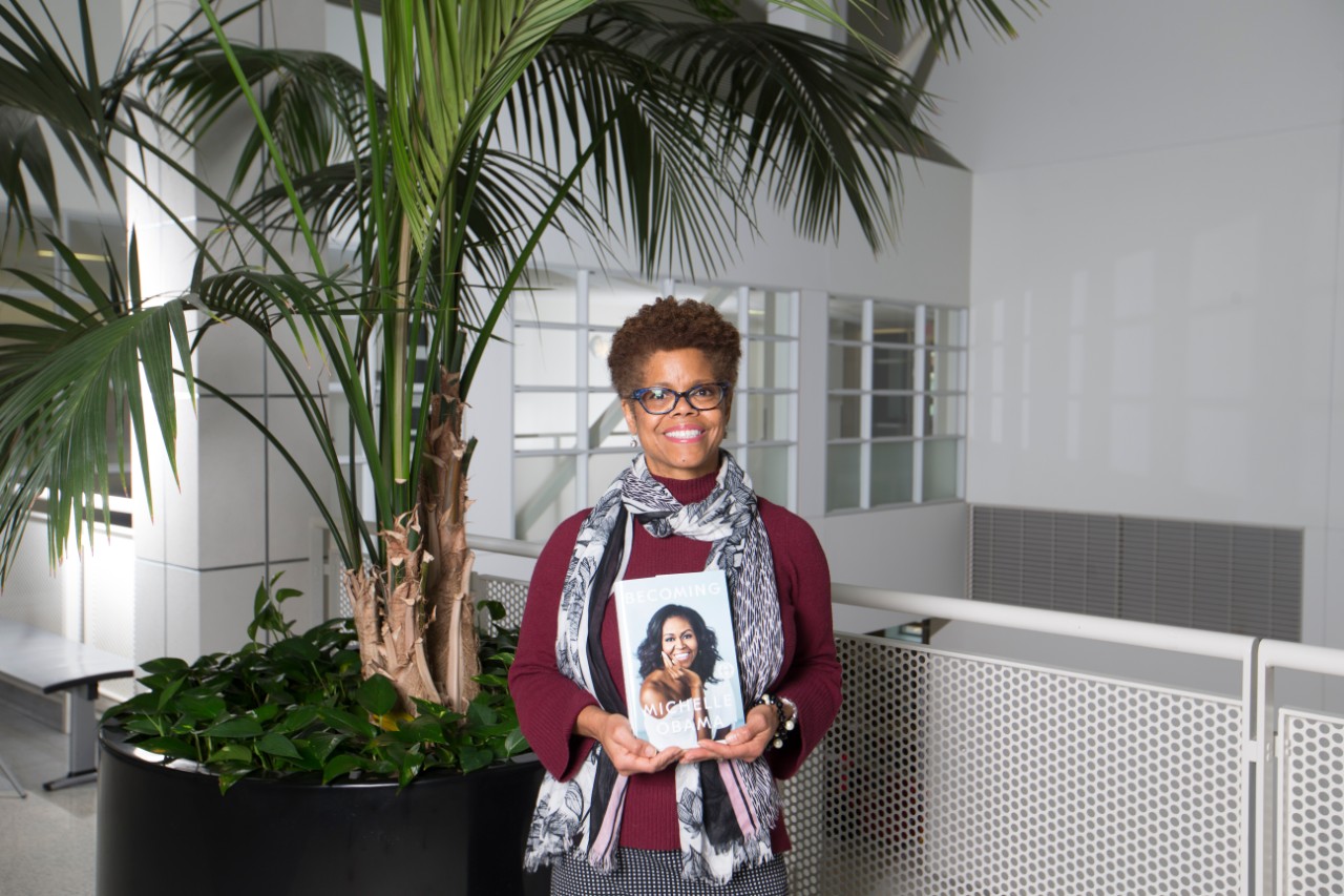 Cincinnati Law Interim Dean Verna Williams holds an autographed copy of Michelle Obama's memoir "Becoming." Williams served as oral historian to the first lady, who used the interviews in writing the book.