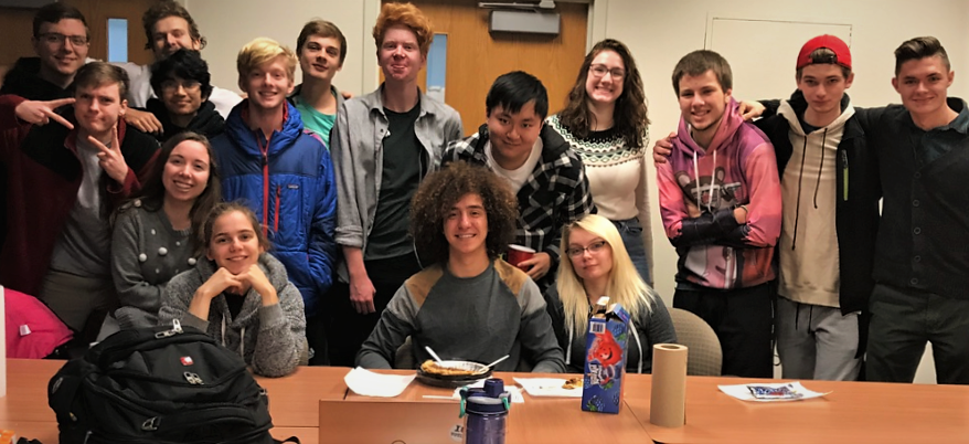 Korash Assani, middle, pictured with UC Physics Club