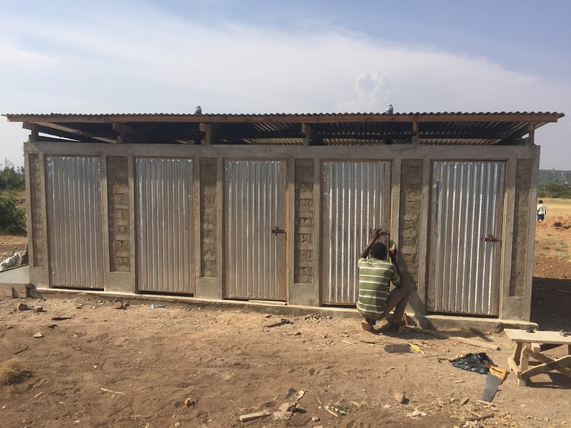 exterior of latrines in Tanzania