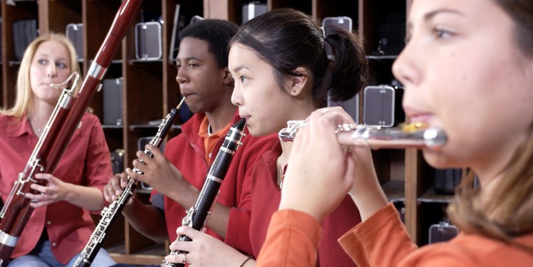 Students practicing their musical instruments.