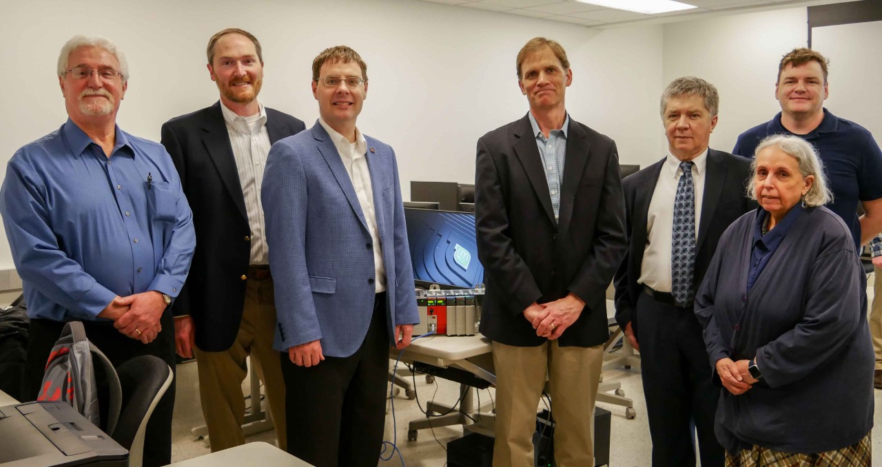 Industry reps pose with UC professors