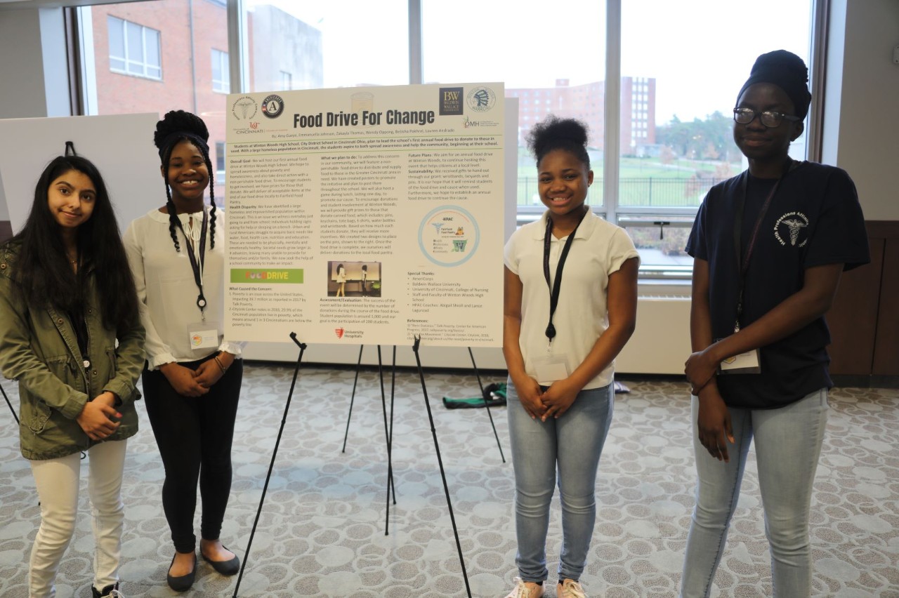 Students from Winton Woods High School by their poster presented at the second annual Southern Ohio Scholars Day March 30, 2019