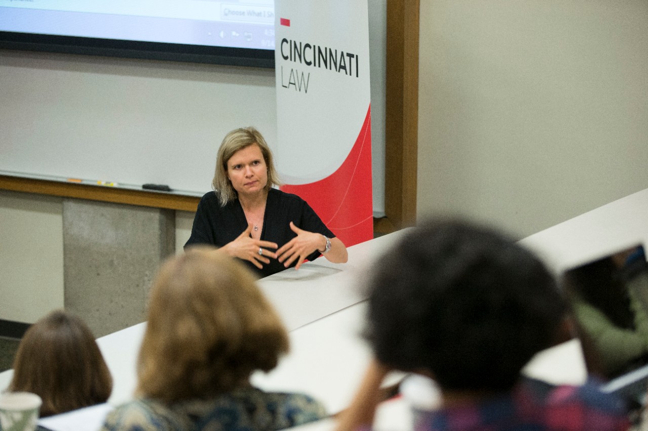 Photo of Dr. Ildiko Szegedy-Maszak engaging in a classroom lecture